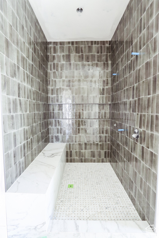 Bathroom with tiled shower