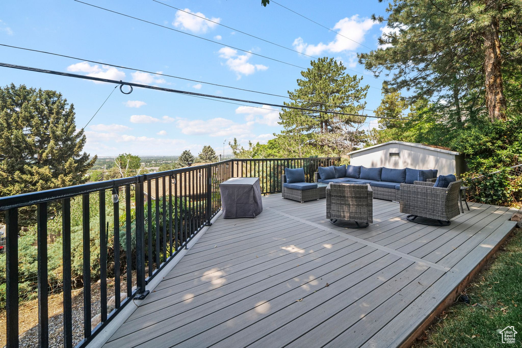 Wooden terrace with an outdoor hangout area