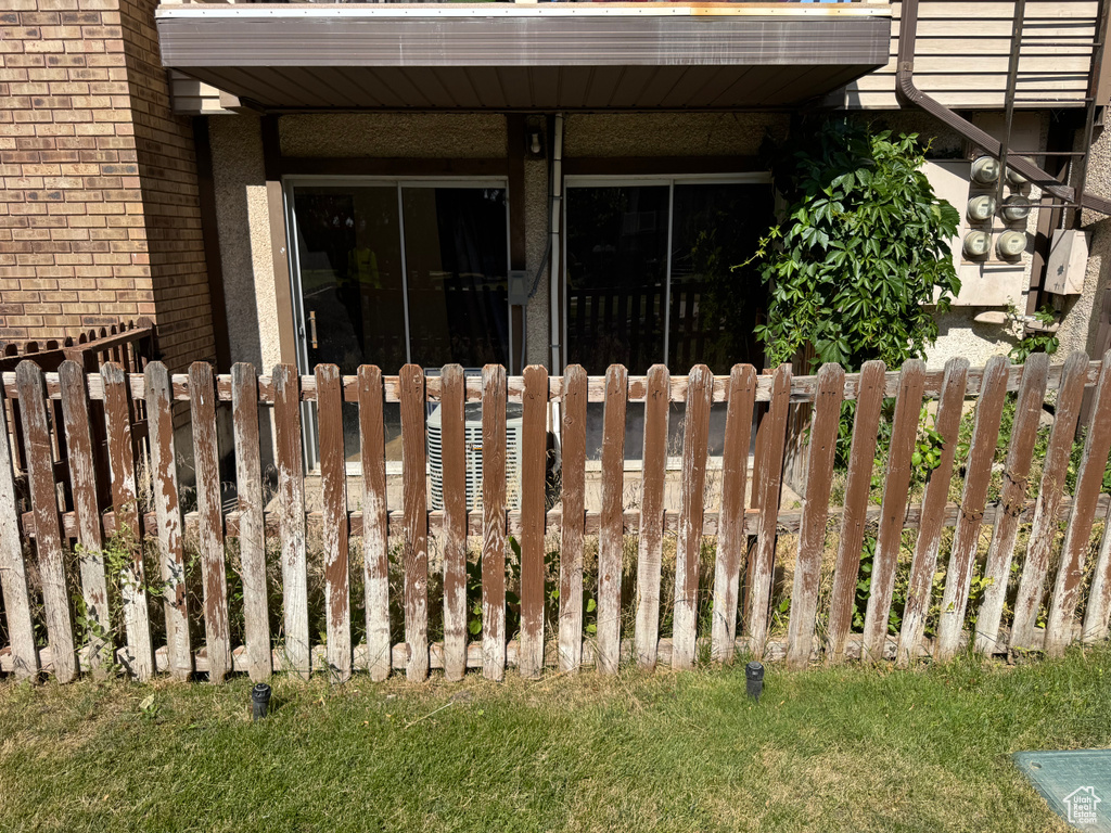 View of property exterior featuring brick siding