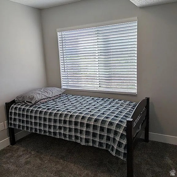 Bedroom with carpet