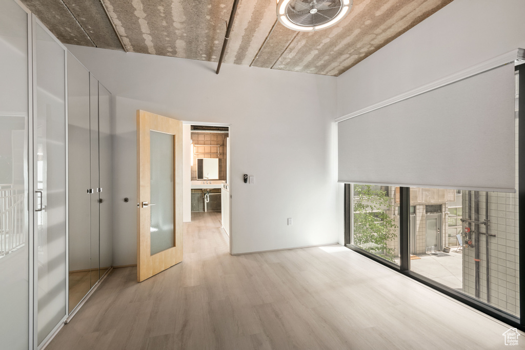 Spare room featuring wood finished floors