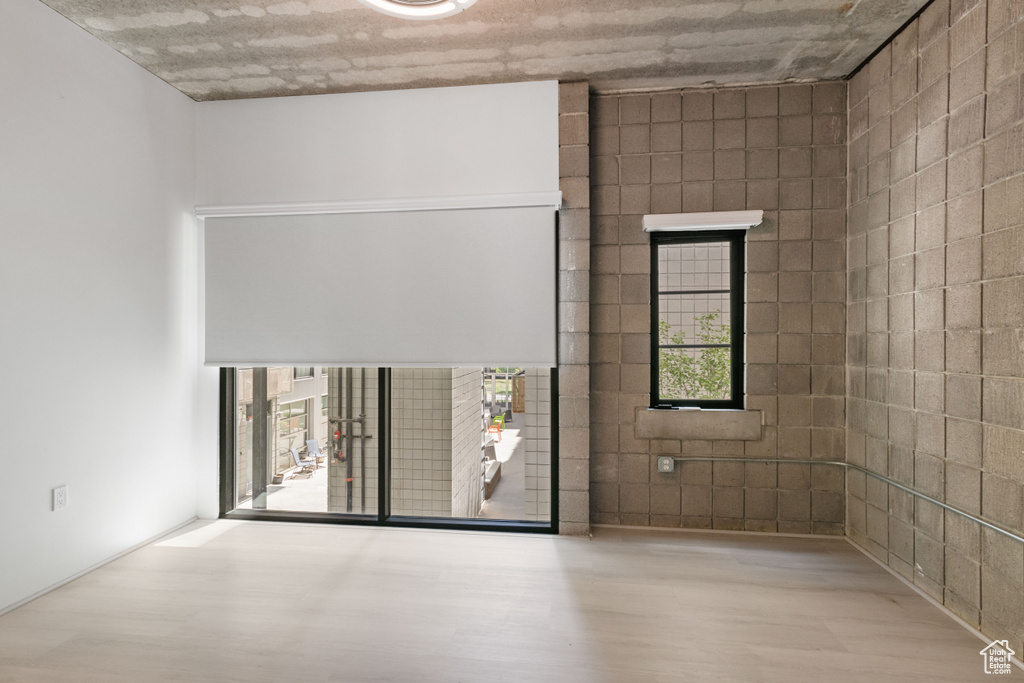 Unfurnished room featuring wood finished floors