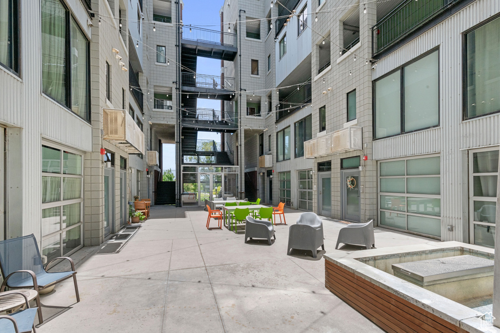 View of home\'s community featuring a patio