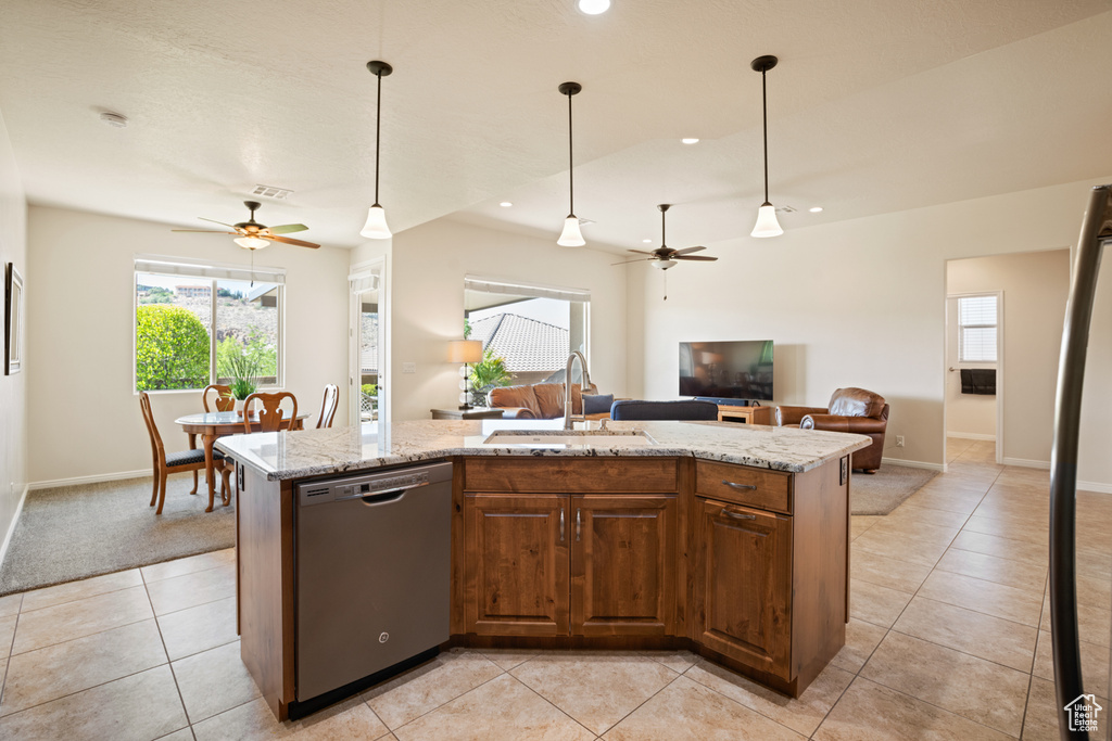 Kitchen featuring stainless steel dishwasher, a ceiling fan, open floor plan, light tile patterned floors, and recessed lighting