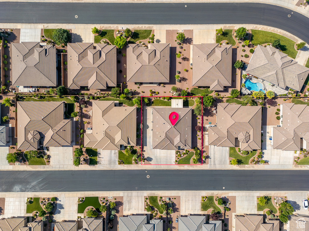 Aerial perspective of suburban area featuring a pool area