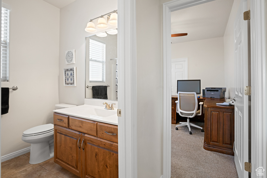 Bathroom with vanity and toilet