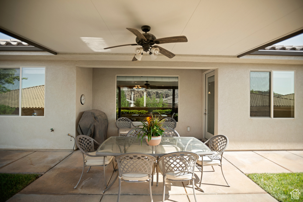 View of patio / terrace featuring ceiling fan and outdoor dining space