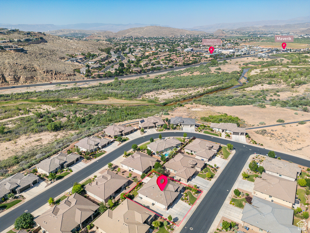 Aerial perspective of suburban area featuring mountains