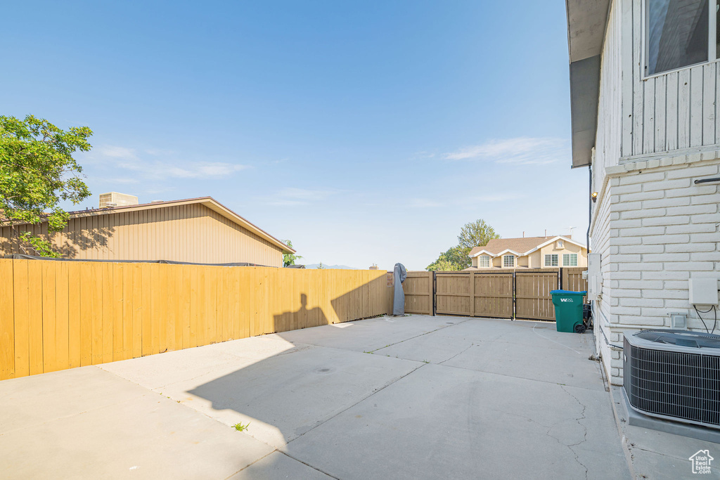 Fenced backyard featuring a patio area