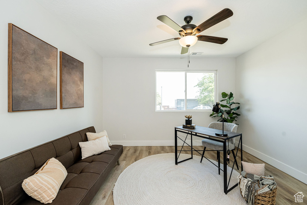 Office featuring light wood finished floors and a ceiling fan