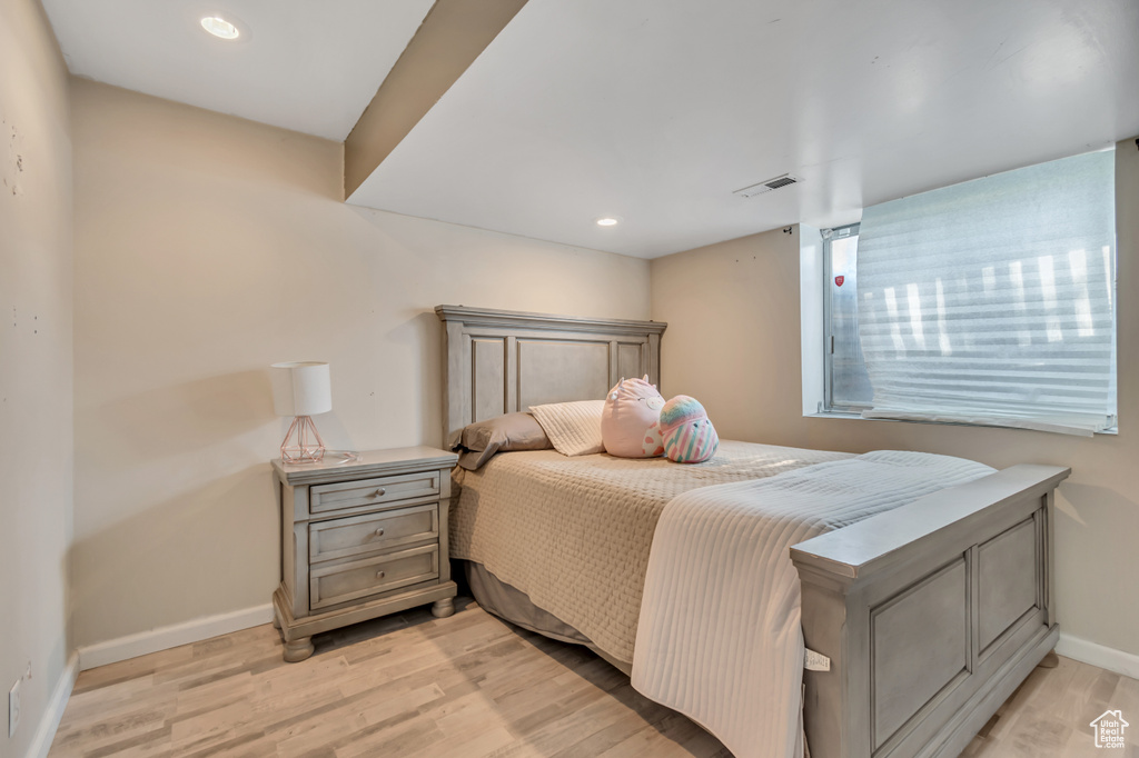 Bedroom featuring light wood-style floors and recessed lighting