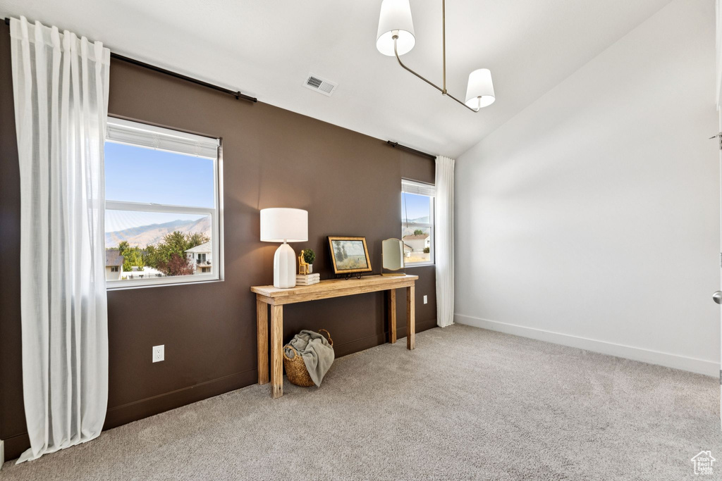 Office space with carpet floors and baseboards