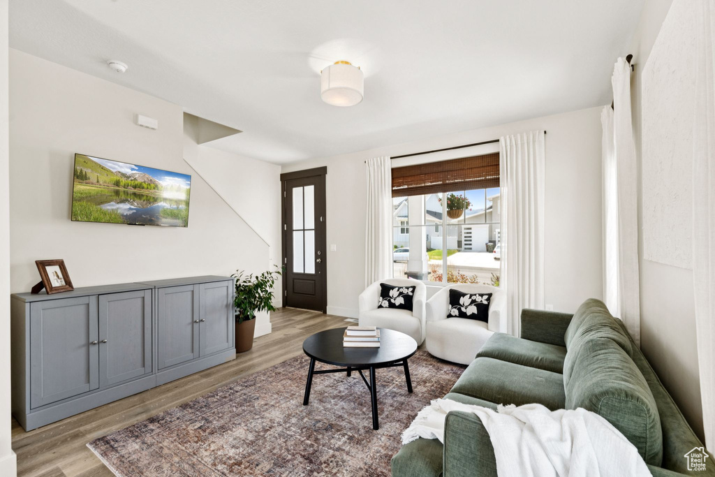 Living area featuring light wood finished floors