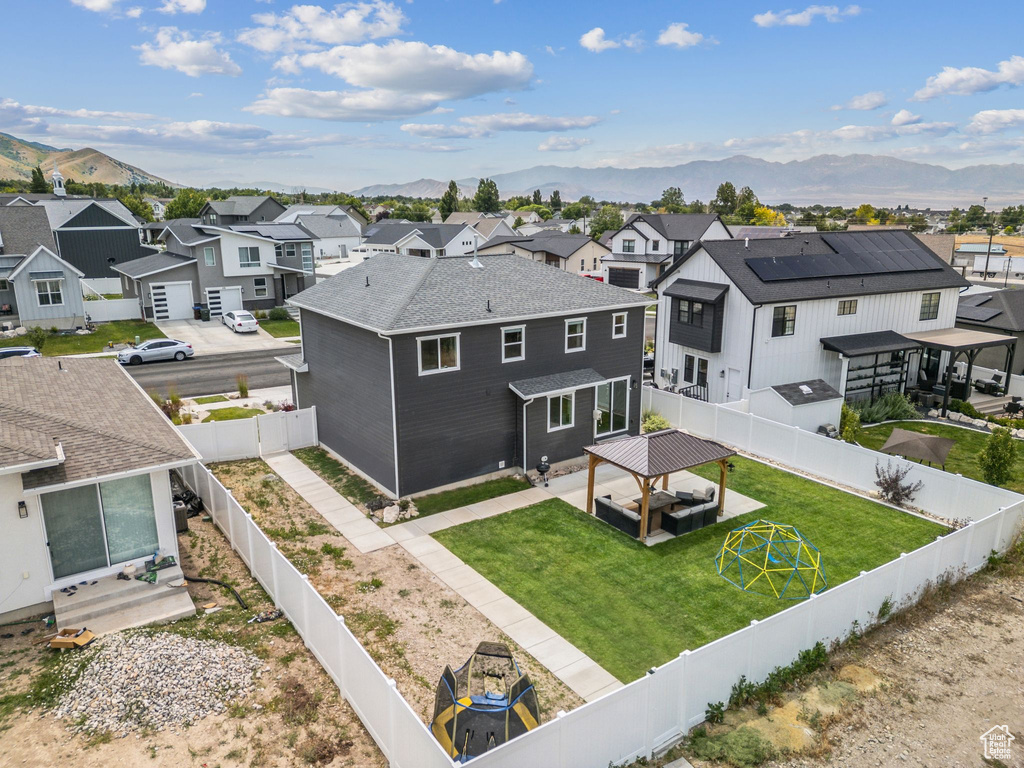 Aerial perspective of suburban area with mountains