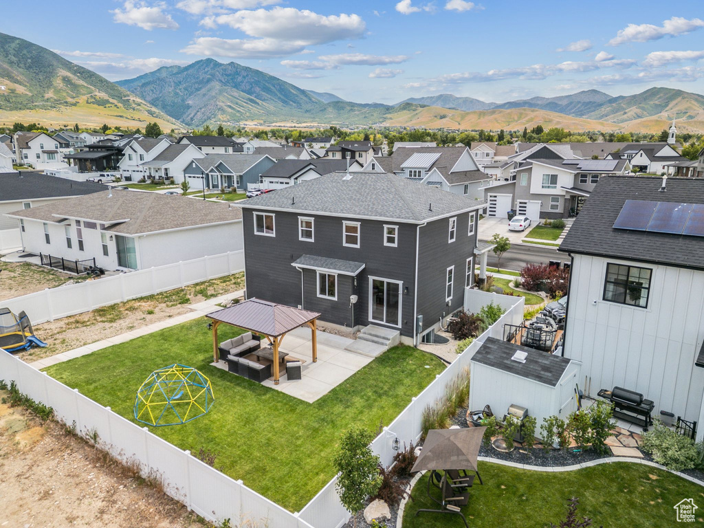Aerial view of residential area with mountains