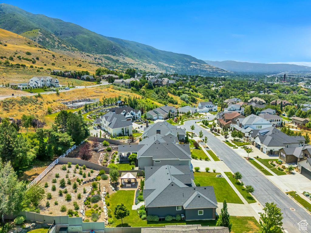Aerial perspective of suburban area featuring mountains