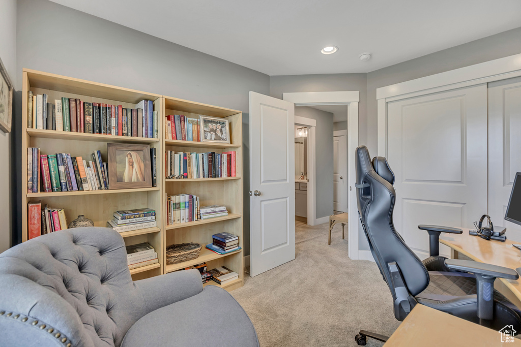 Office area featuring light colored carpet and recessed lighting