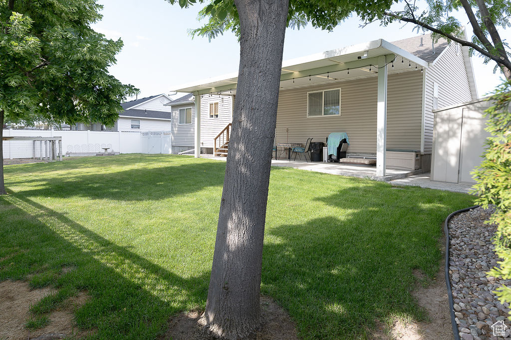 Back of property featuring a patio area and entry steps