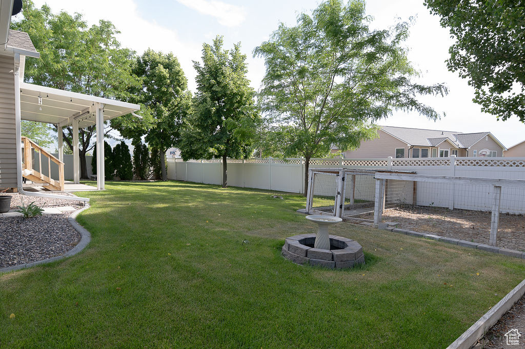 View of fenced backyard