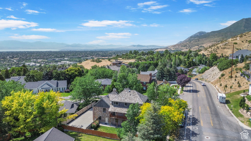 Aerial view of residential area with a mountainous background