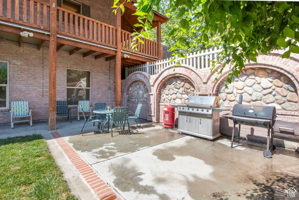 Patio / terrace with a patio area and grilling area