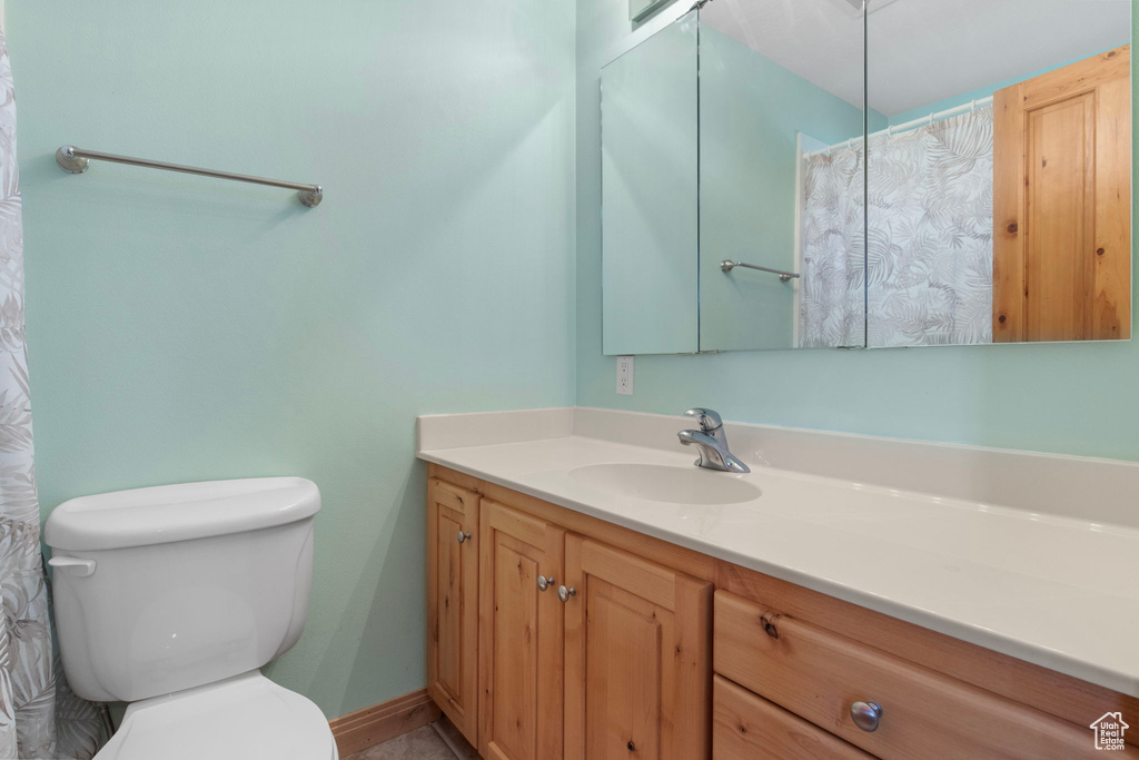 Bathroom with vanity and toilet