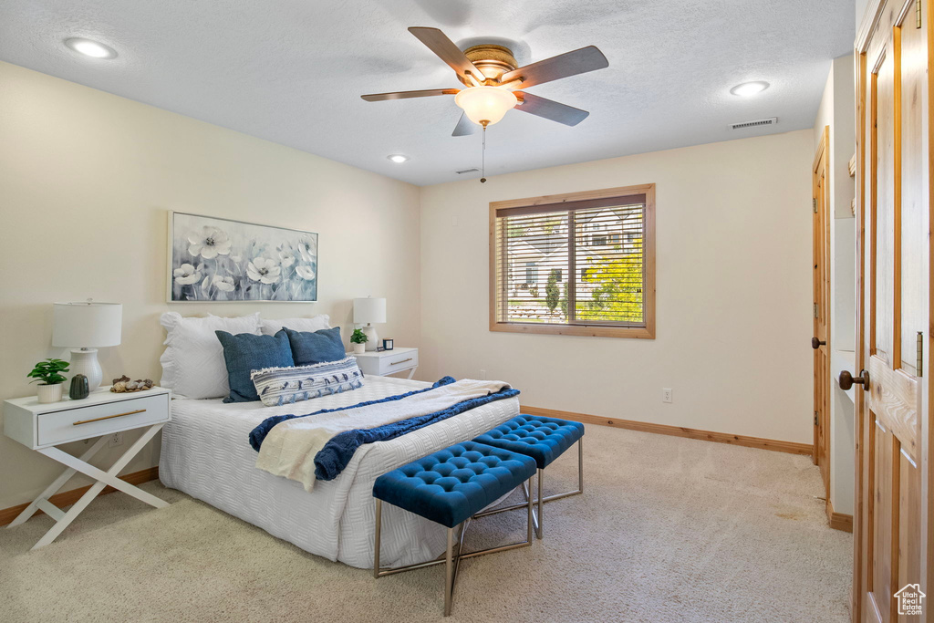 Bedroom featuring carpet flooring, recessed lighting, and a ceiling fan