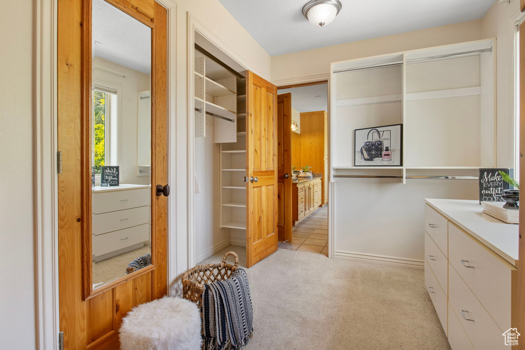 Bathroom with vanity and baseboards