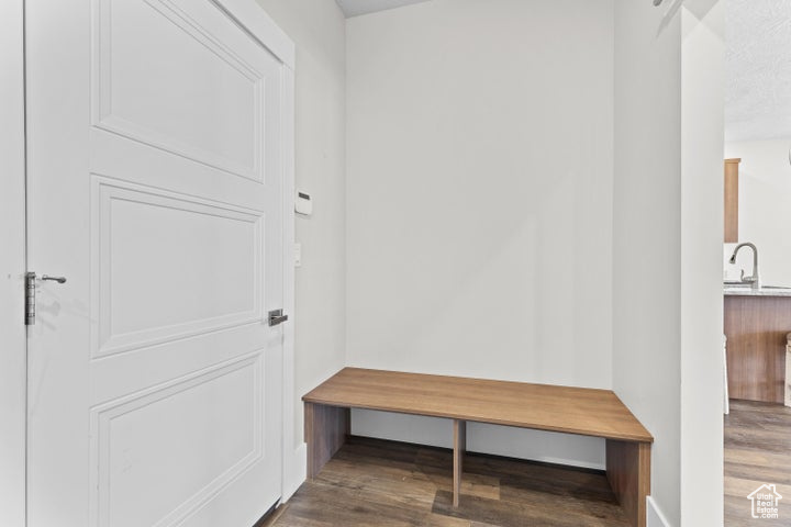 Mudroom with wood finished floors