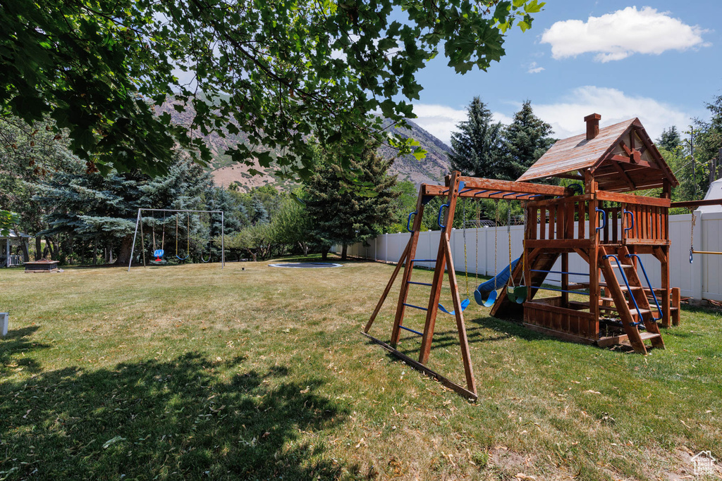 View of yard with a playground