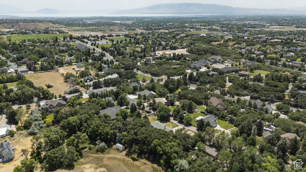 Aerial overview of property\\\'s location with a mountainous background