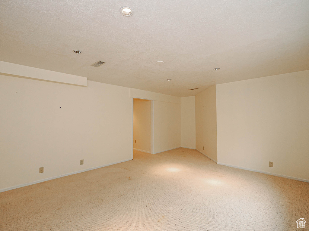 Spare room featuring baseboards