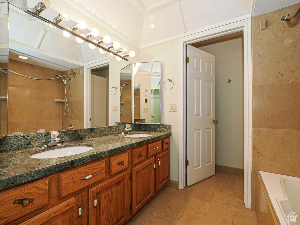 Bathroom featuring double vanity