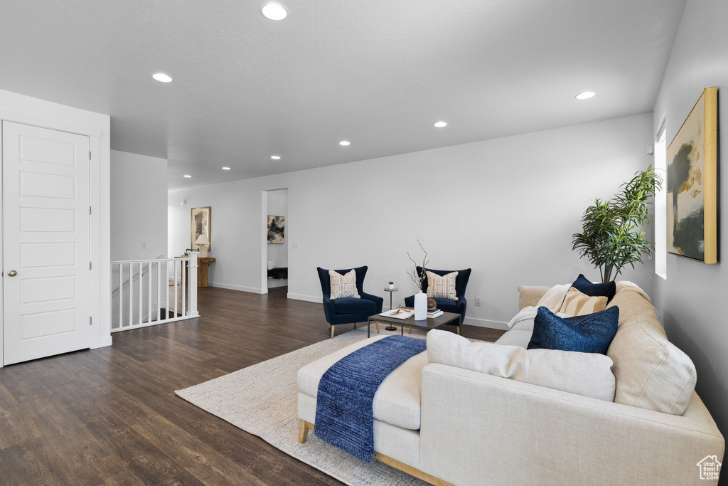 Living area with recessed lighting and wood finished floors