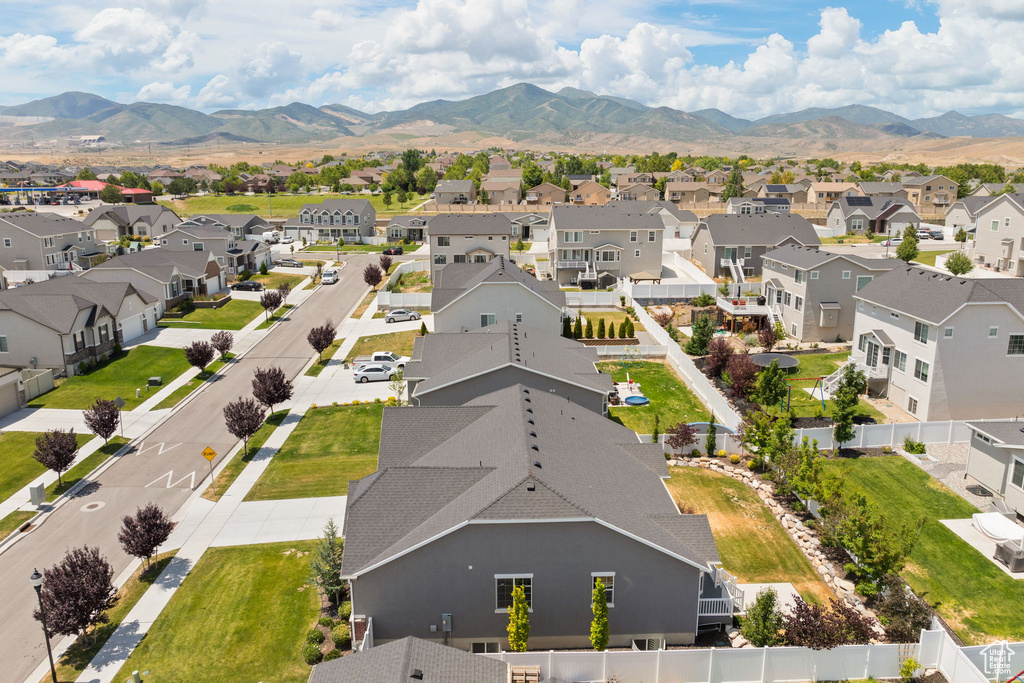Aerial view of residential area with mountains