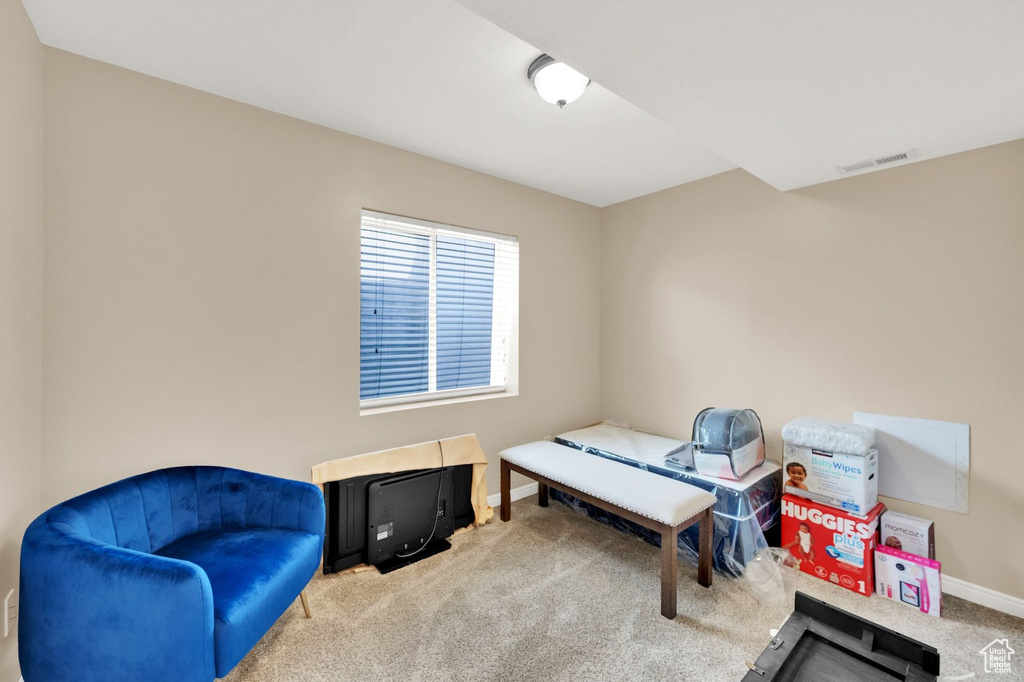 Carpeted bedroom with baseboards
