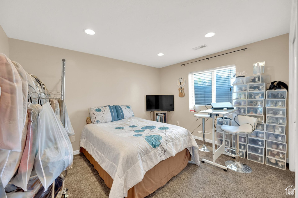 Bedroom featuring carpet flooring and recessed lighting