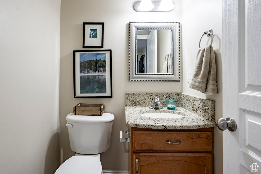 Bathroom with vanity and toilet