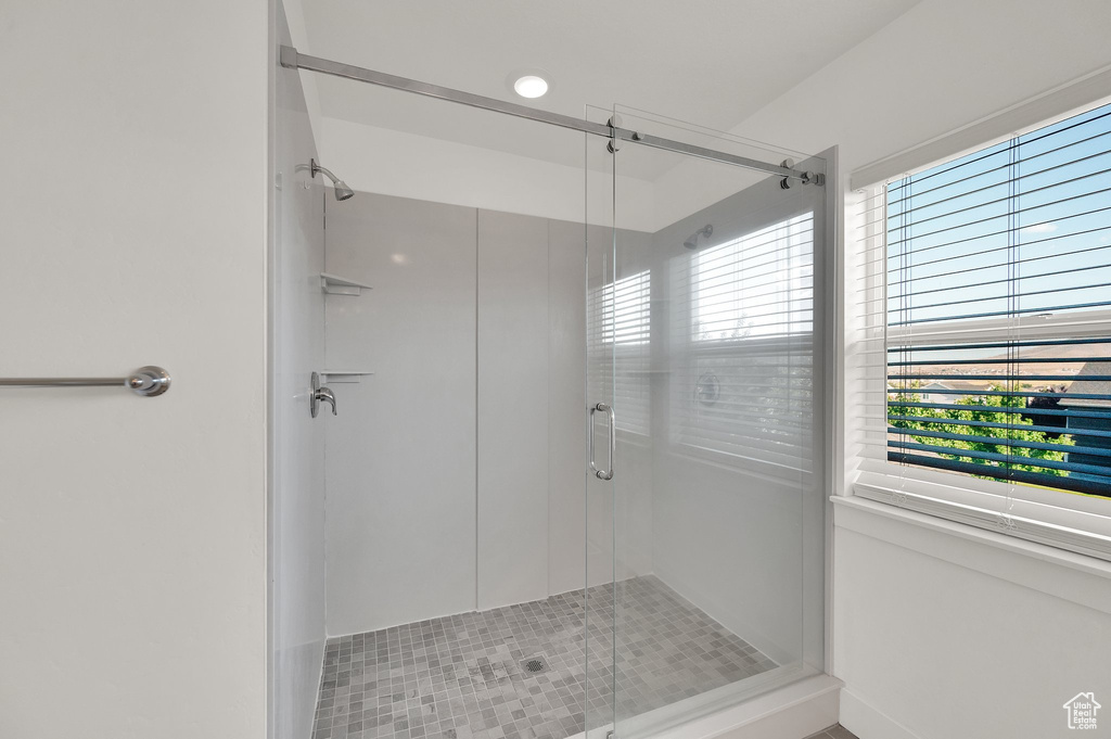 Bathroom featuring a shower stall