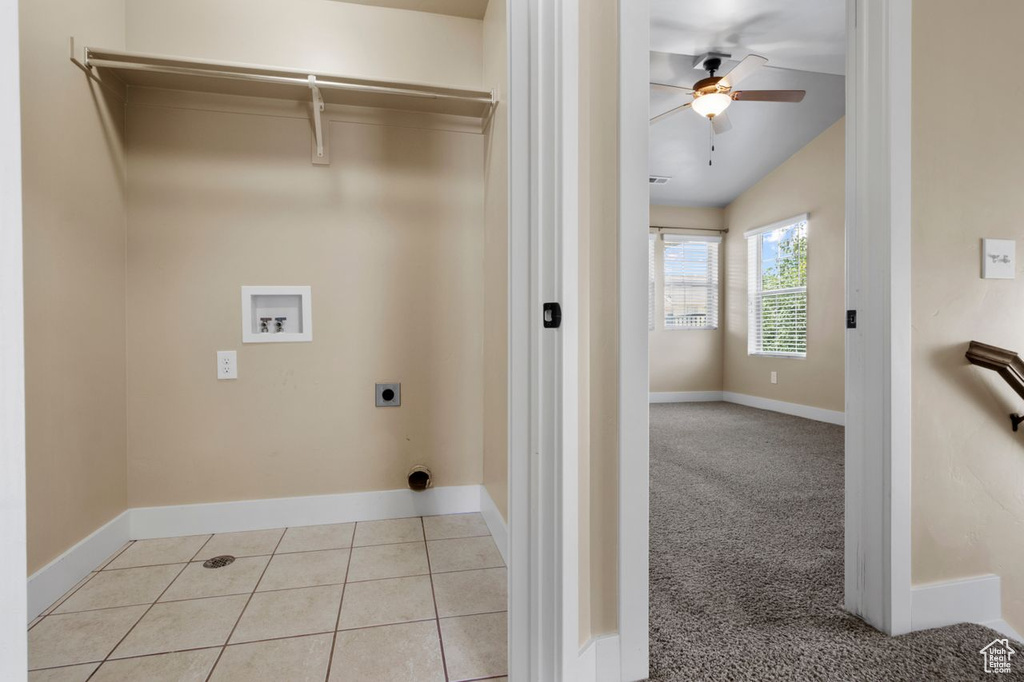 Laundry area featuring electric dryer hookup, washer hookup, and a ceiling fan