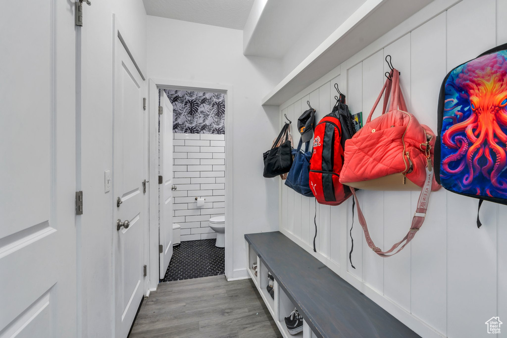 Mudroom with wood finished floors