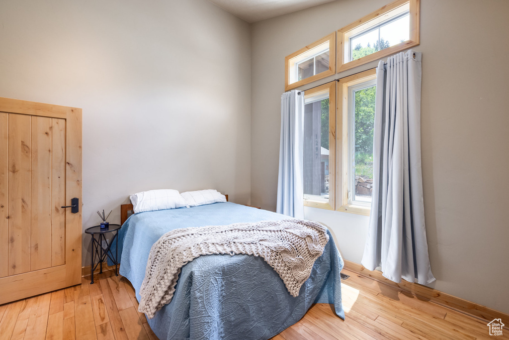 Bedroom with light wood finished floors