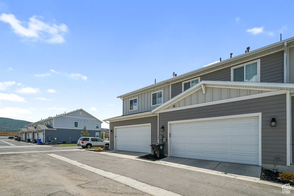 View of front of house with board and batten siding