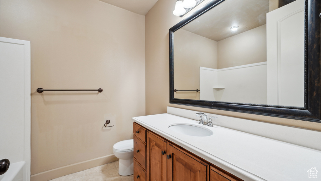 Full bathroom featuring vanity and tile patterned floors