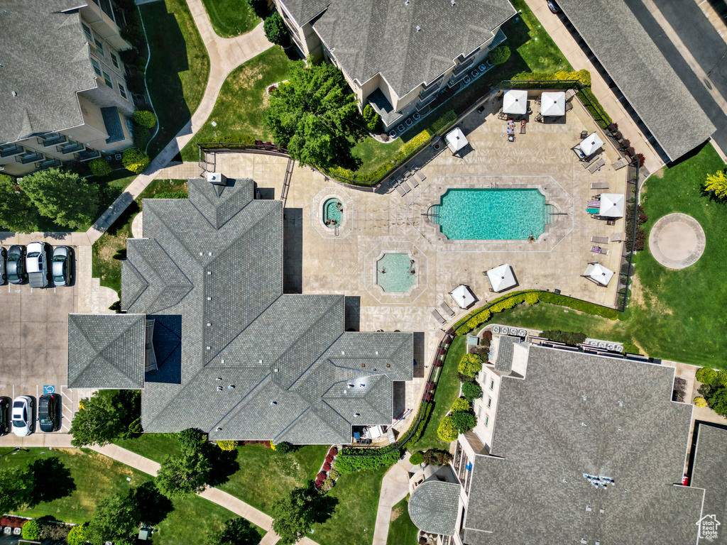 Aerial view of property's location featuring a pool area