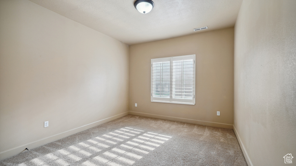 Spare room with carpet