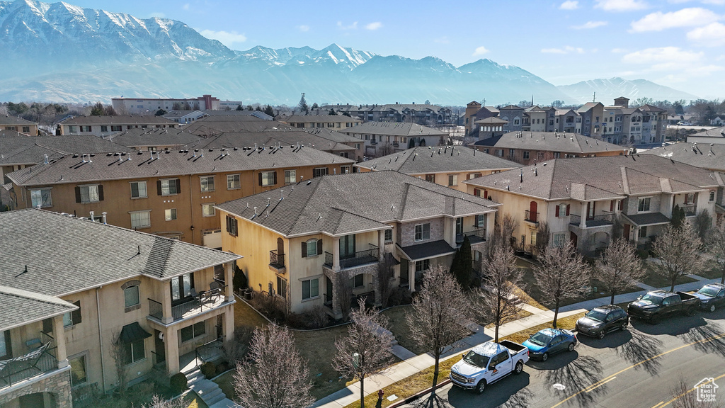 Aerial view of residential area with a mountain backdrop