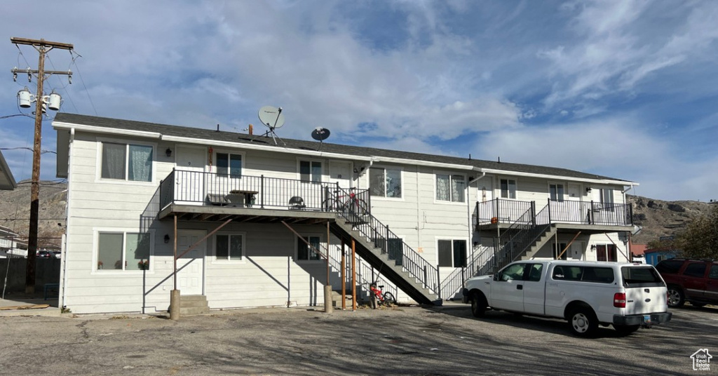 View of property with stairway