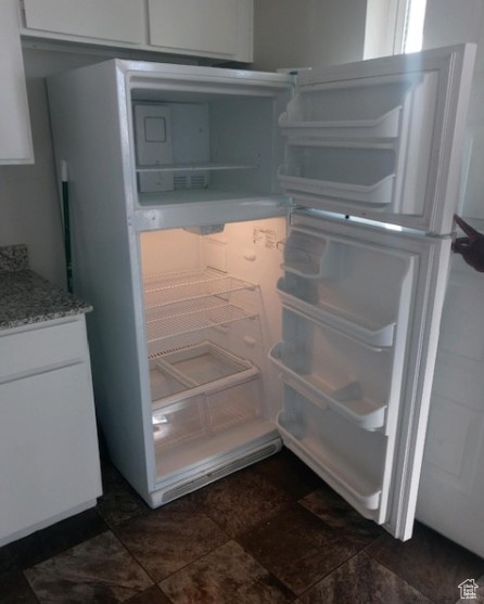 Kitchen view of white cabinets