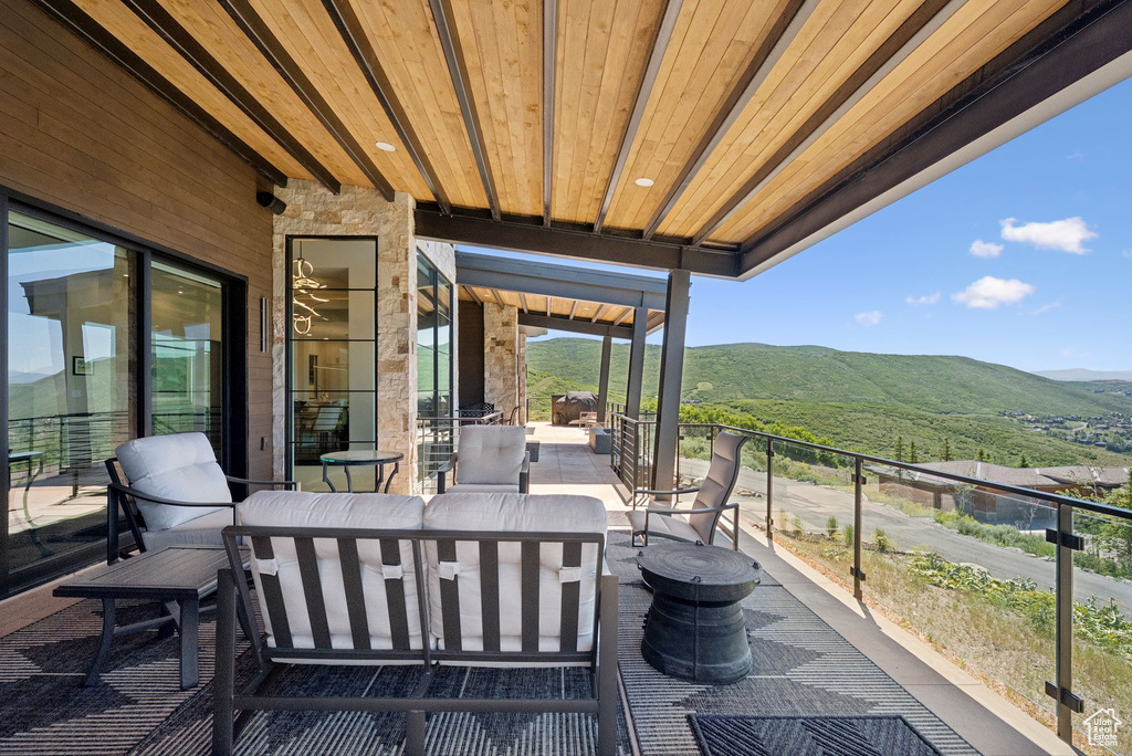 Patio / terrace with a mountain view